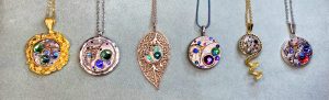 photo of watch movement necklaces